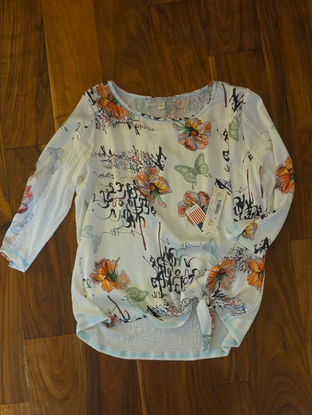 SNO SKINS Cream Blouse with Orange Floral & Green Butterfly Print